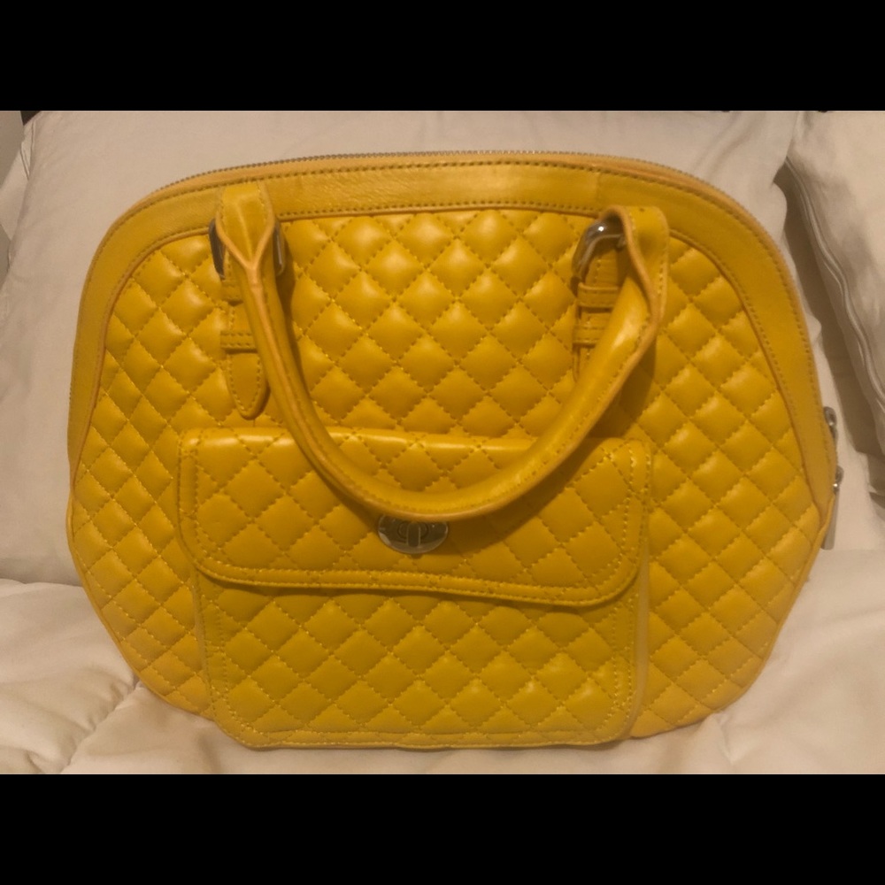 Authentic DANIER  purse. Only use once. Perfect condition.